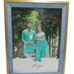 Customized 9x12 inch wooden photo frame with blue and golden border featuring a couple photo and 'I love you' text – perfect for romantic personalized gifts
